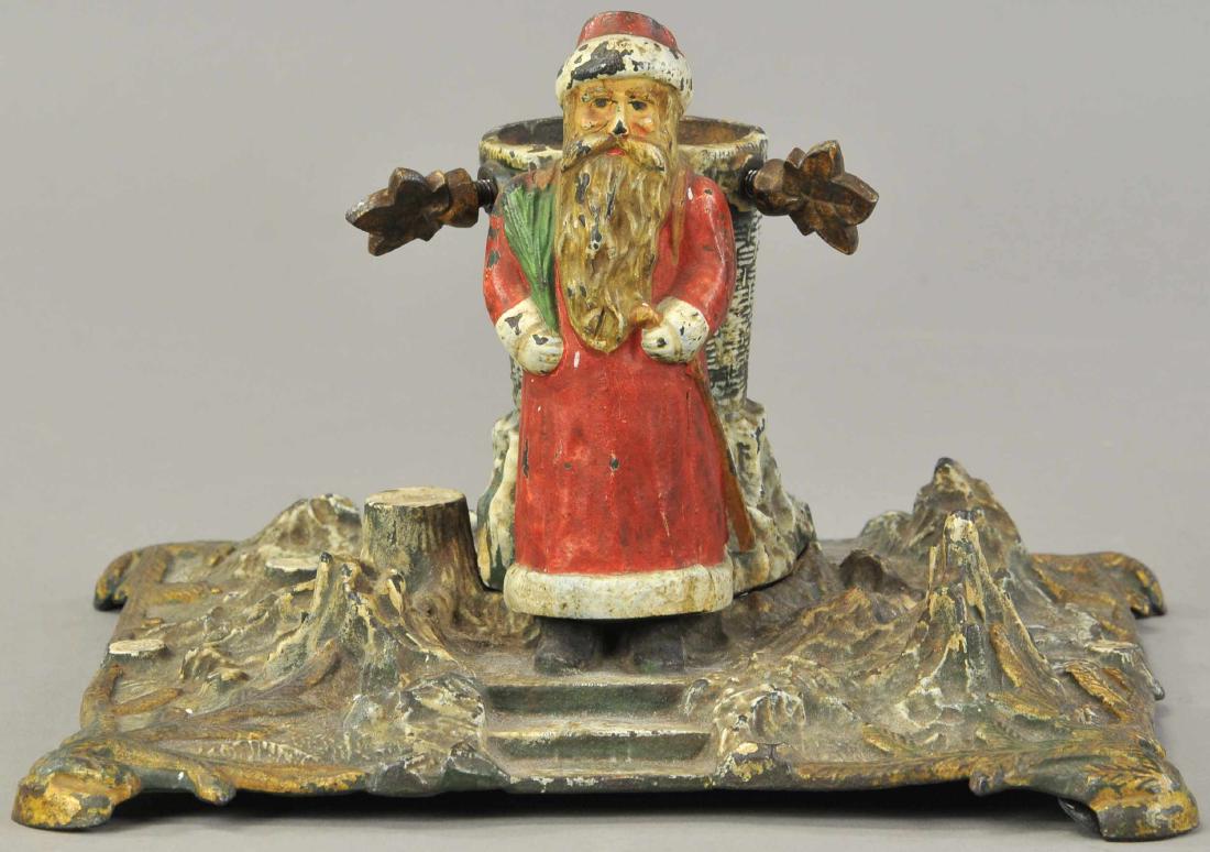CAST IRON SANTA TREE HOLDER (1 of 3)