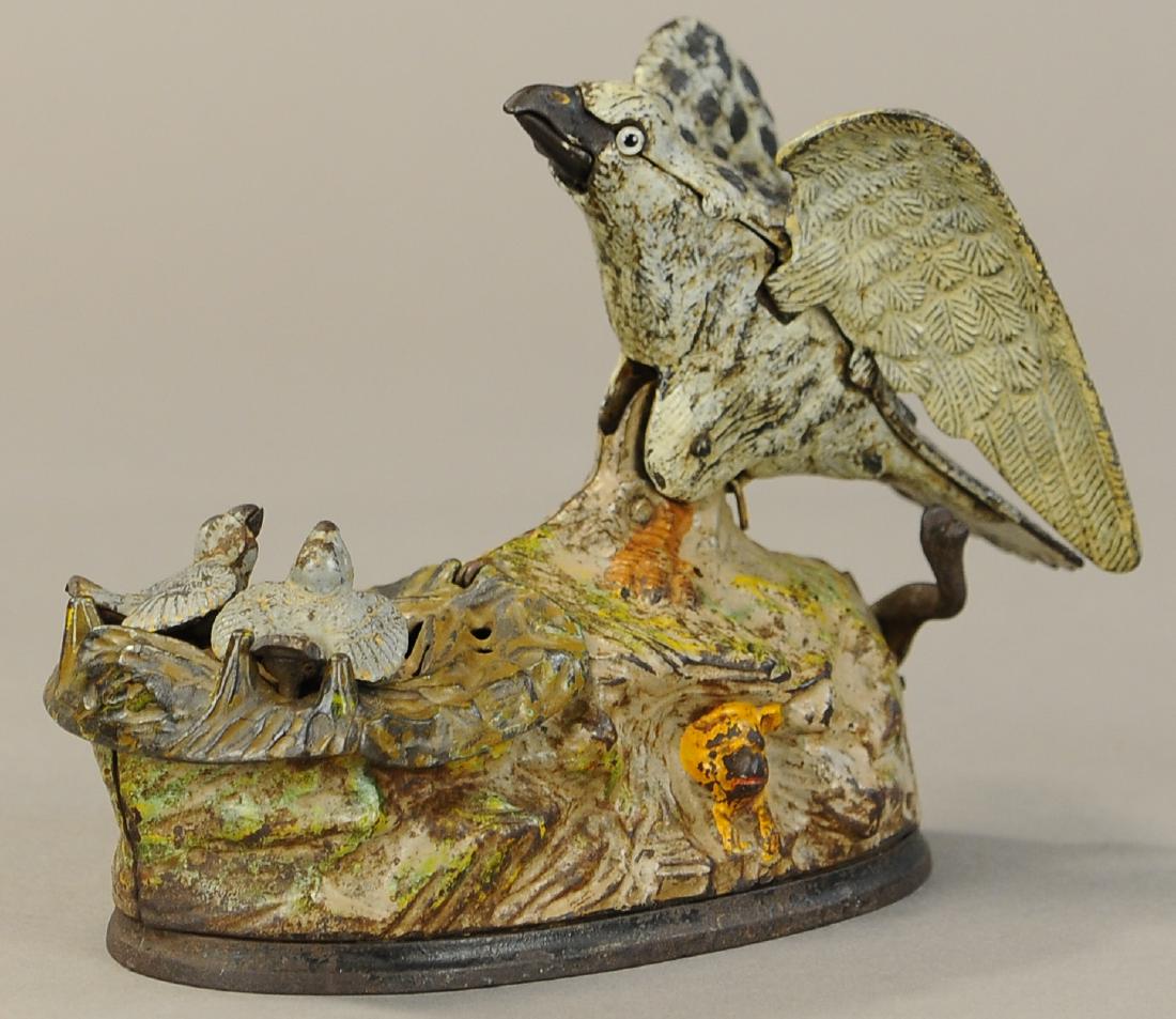 EAGLE & EAGLETTS MECHANICAL BANK - TAN (1 of 3)