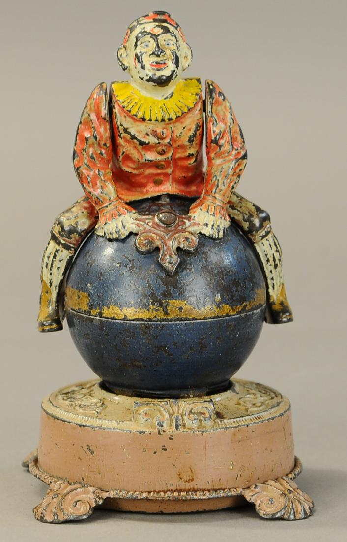 CLOWN ON GLOBE MECHANICAL BANK (1 of 4)