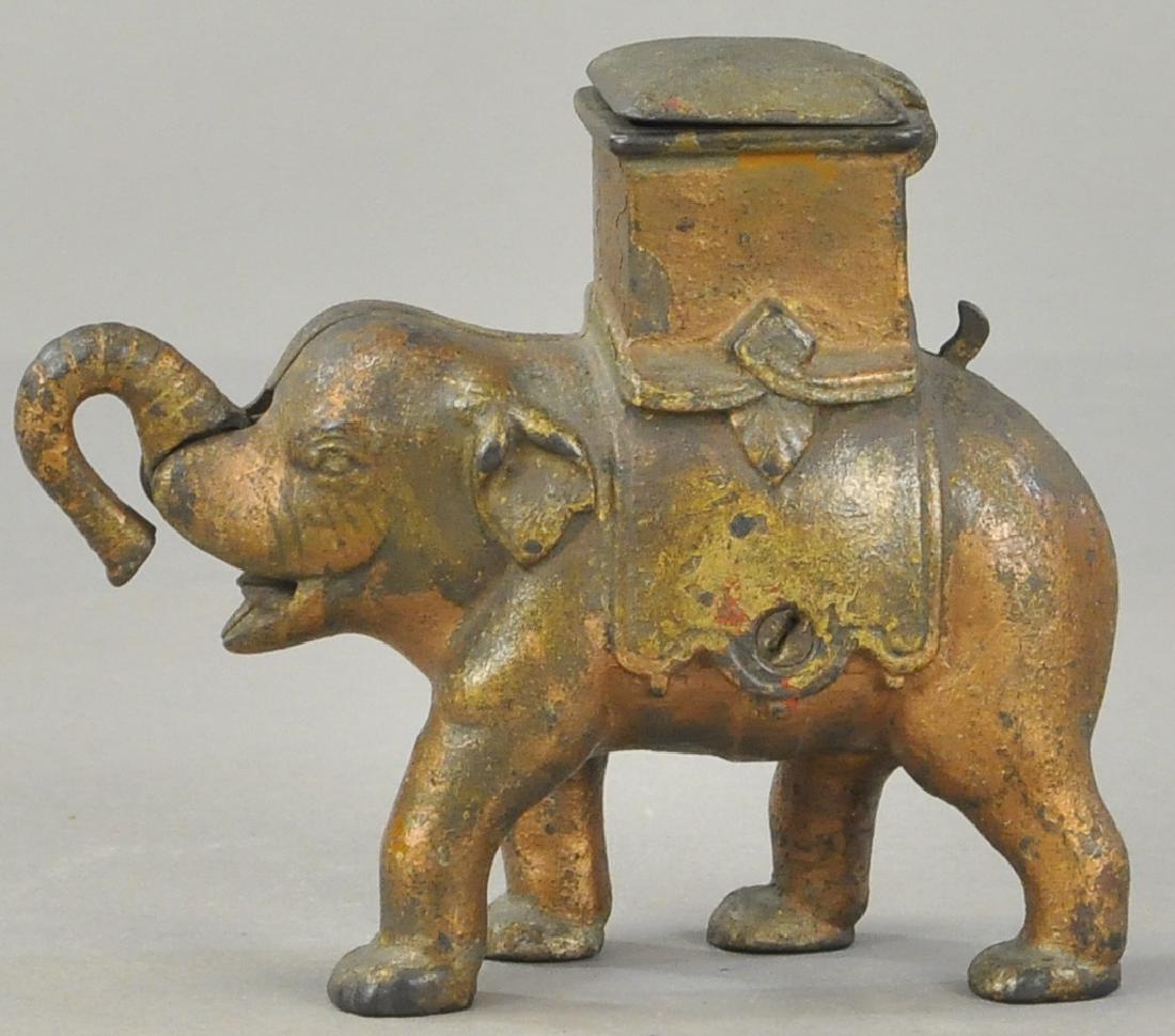 ELEPHANT MAN POPS OUT MECHANICAL BANK (1 of 3)
