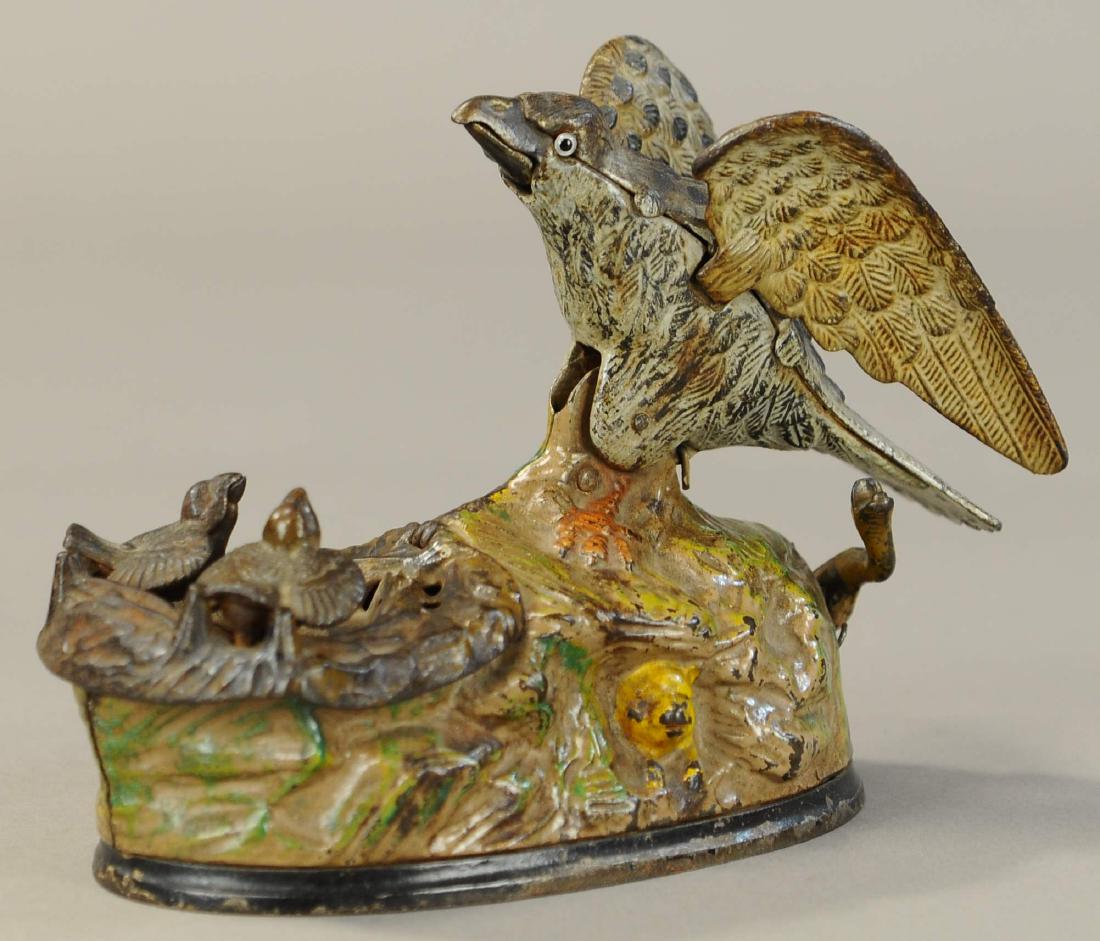 EAGLE W/ EAGLETTS MECHANICAL BANK (1 of 3)