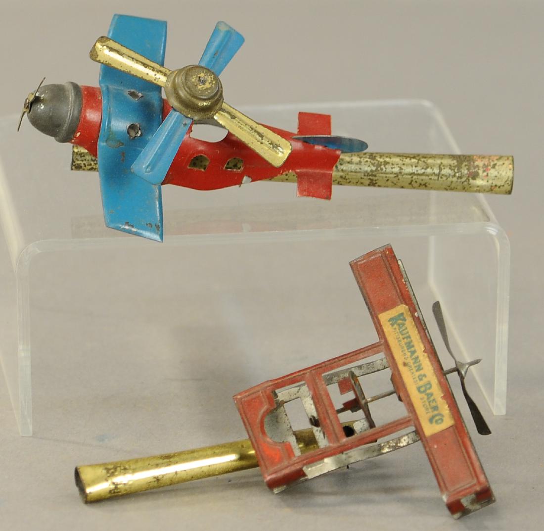 TWO AERONAUTICAL WHISTLE PENNY TOYS (1 of 3)