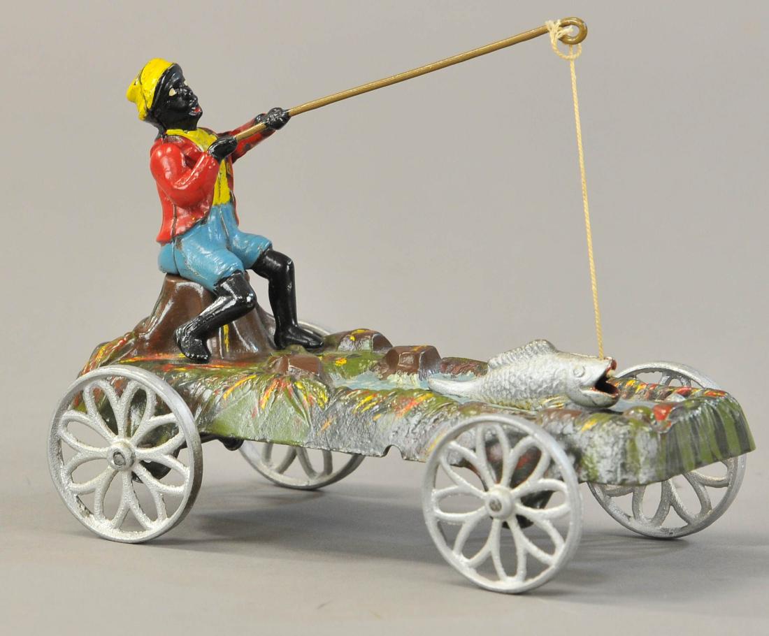 J. & E. STEVENS BOY FISHING PULL TOY (1 of 2)