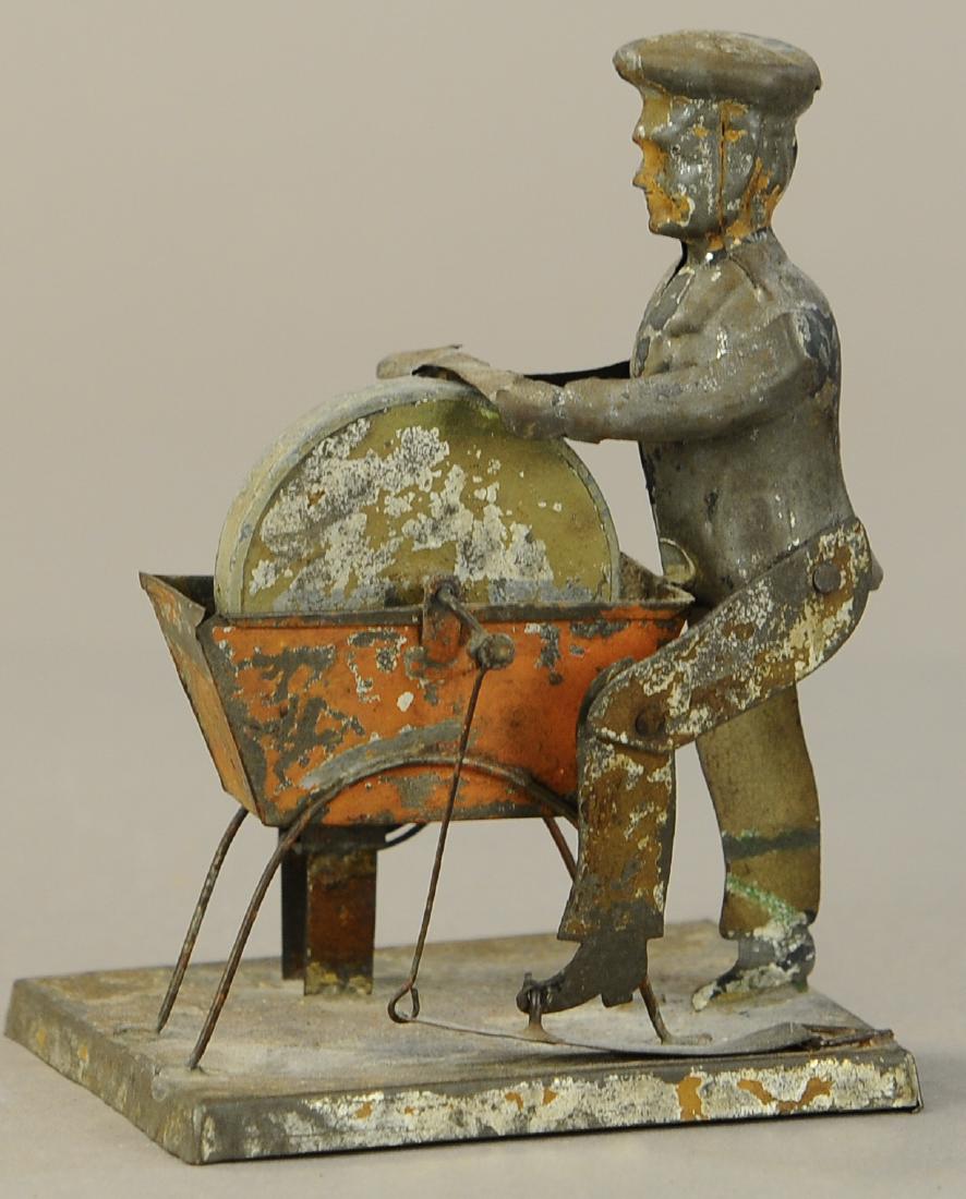 GERMAN TIN WIND-UP BLACKSMITH TOY (1 of 3)