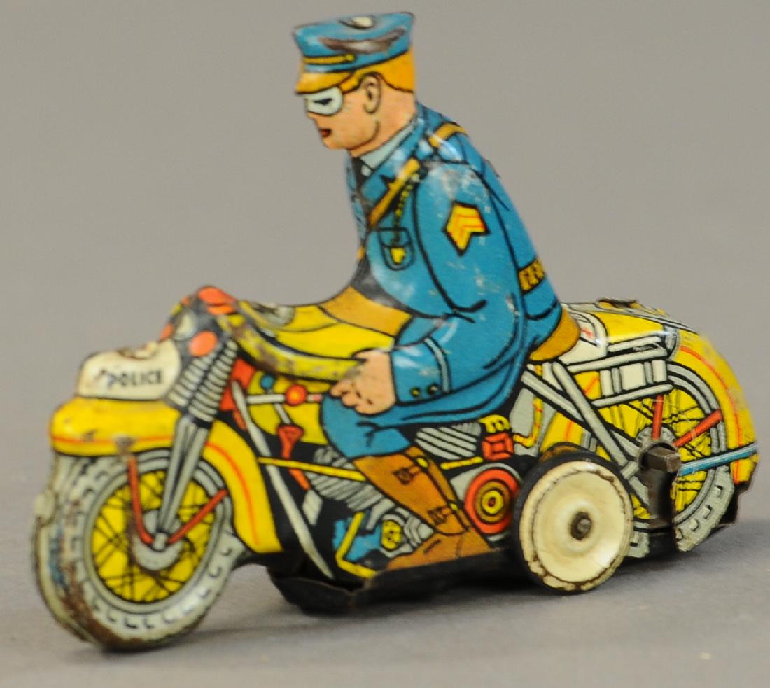 MARX TRICKY POLICE MOTORCYCLE (1 of 3)