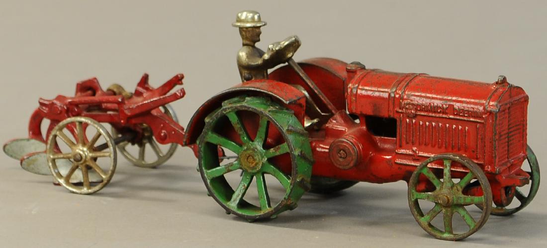 ARCADE MCCORMICK DEERING TRACTOR W/ PLOW (1 of 3)