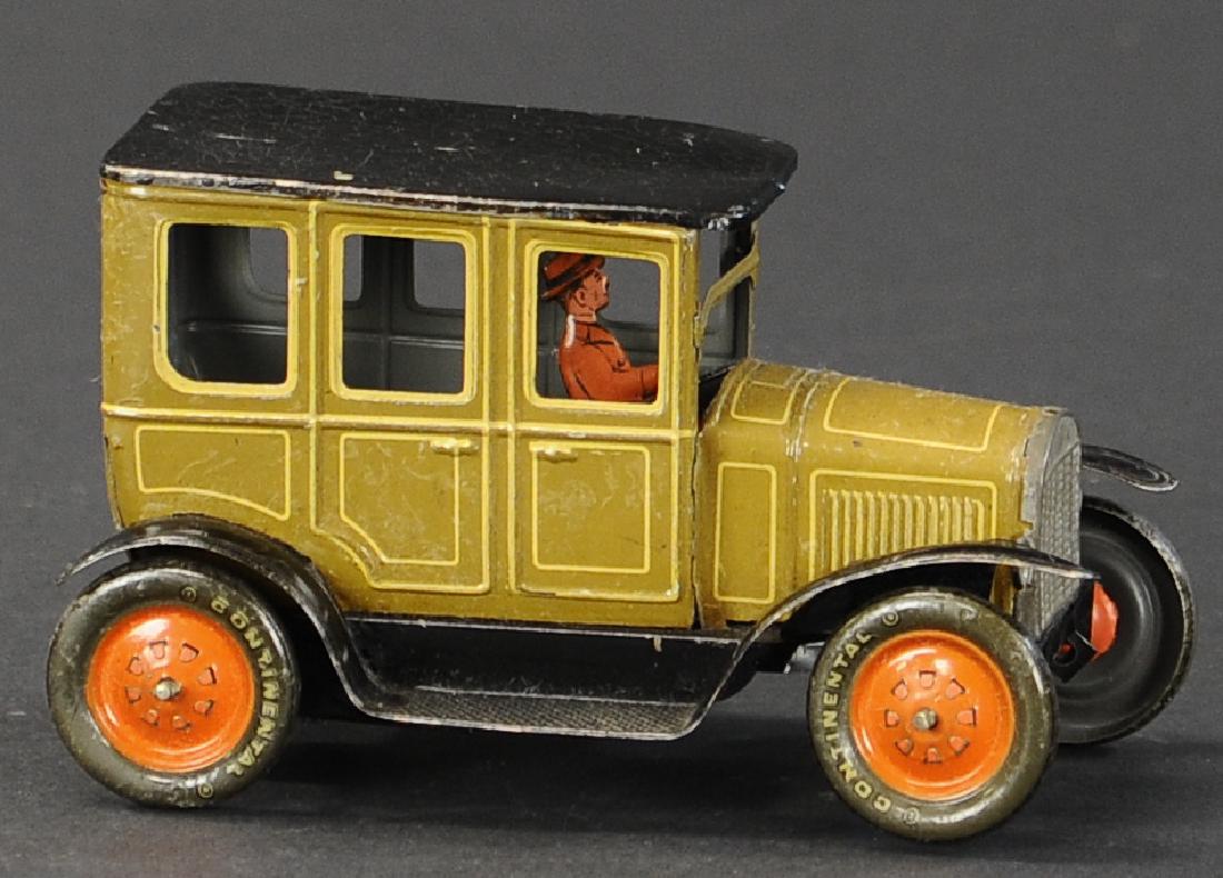 UNUSUAL COLOR BING SEDAN: 424. UNUSUAL COLOR BING SEDAN | Germany c. 1920s, wind-up car, key fixed on side in front of left rear wheel, front axle can be fixed in position to make sharp left turns or slight right turns. Proven