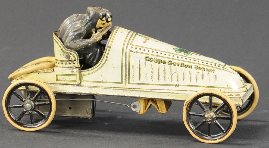 GUNTHERMANN GORDON BENNETT RACER: 433. GUNTHERMANN GORDON BENNETT RACER | Wind-up mechanism wound by fixed key in front of rear left wheel, rear axle moves shaft that operates bellows-type noise maker. Provenance: Donald Kaufman Colle