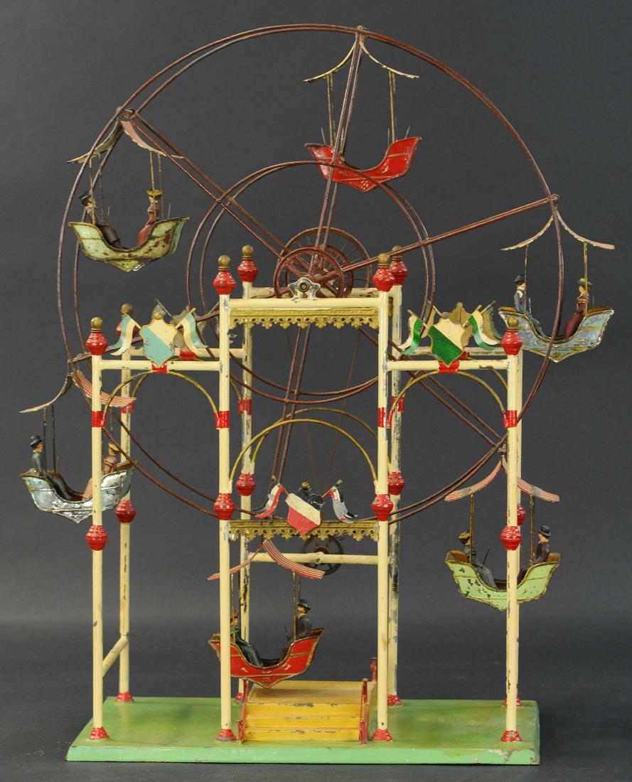 INCREDIBLE FERRIS WHEEL STEAM ACCESSORY: 497. INCREDIBLE FERRIS WHEEL STEAM ACCESSORY | Large ferris wheel with attractive spoke wheel at center that drives the ride, each gondola has red and white striped peeked roof and seats with pins for