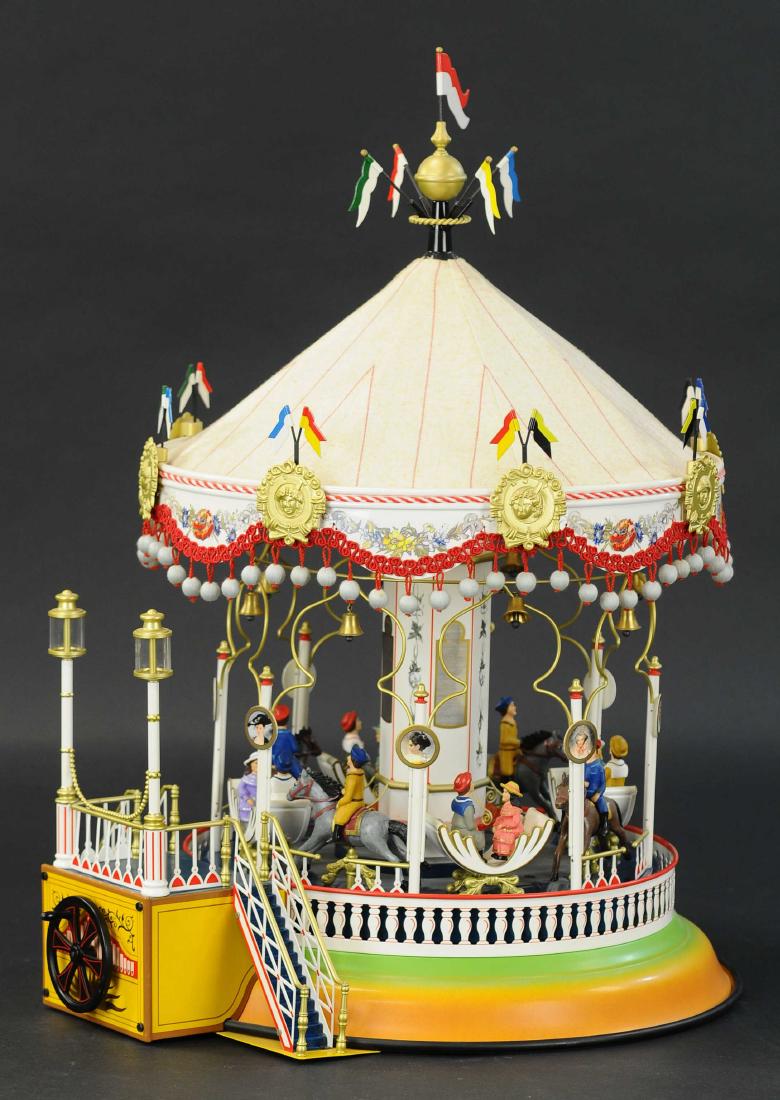 MARKLIN CAROUSEL: 498. MARKLIN CAROUSEL | Germany, c. 2000, classic amusement toy, wheel at front operates the spinning of the carousel wheel, canvas top canopy is quite detailed, composition figures contained with toy