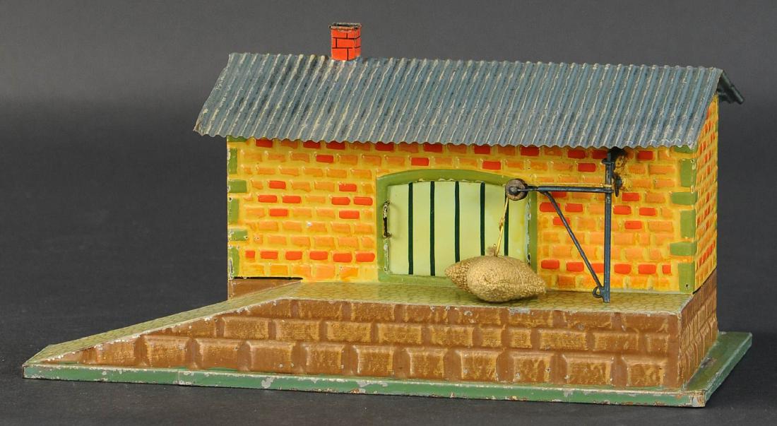 EARLY MARKLIN FREIGHT SHED WITH RAMP: 529. EARLY MARKLIN FREIGHT SHED WITH RAMP | Hand painted, O gauge. | Base 10.5" x 6"; ramp 13.5" l.