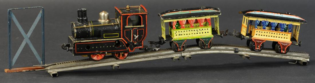 MARKLIN COG RAILWAY O GAUGE SET: 554. MARKLIN COG RAILWAY O GAUGE SET | 0 gauge, one cog railway tract section included with replacement elevated support stand, two summer cars have four replacement figures, | loco 6" l.