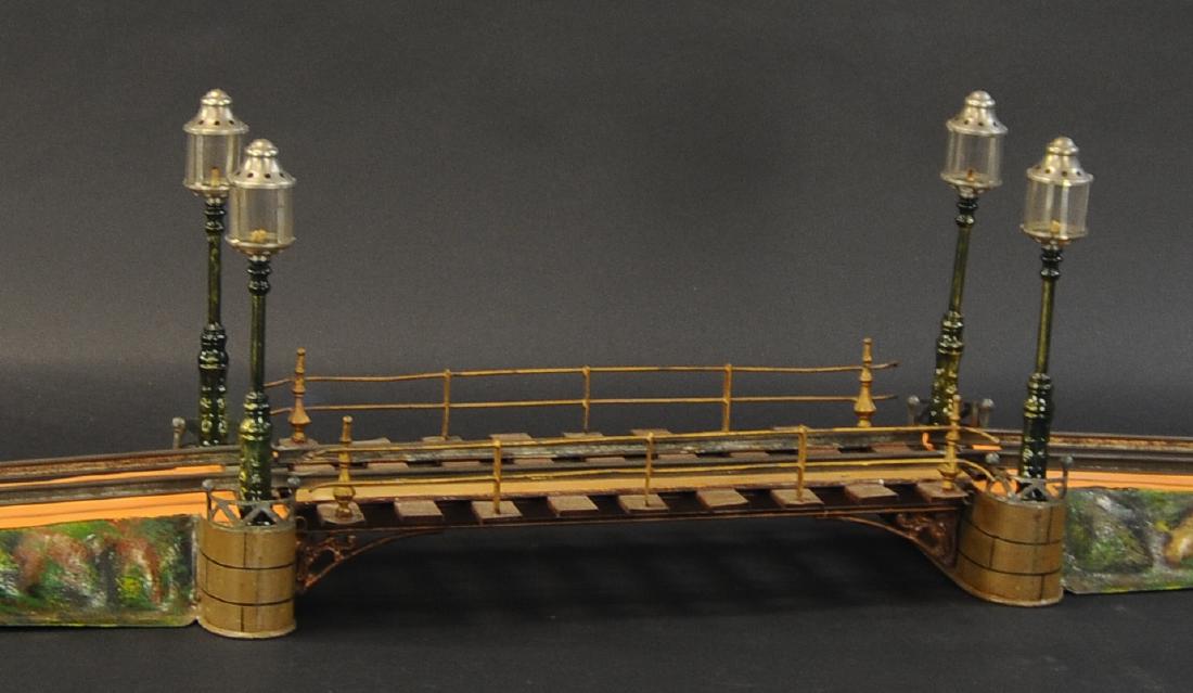 MARKLIN GAUGE 2 SINGLE SPAN BRIDGE W/ LAMPS: 609. MARKLIN GAUGE 2 SINGLE SPAN BRIDGE W/ LAMPS | 2 gauge, clockwork two rail track. | 70" l.