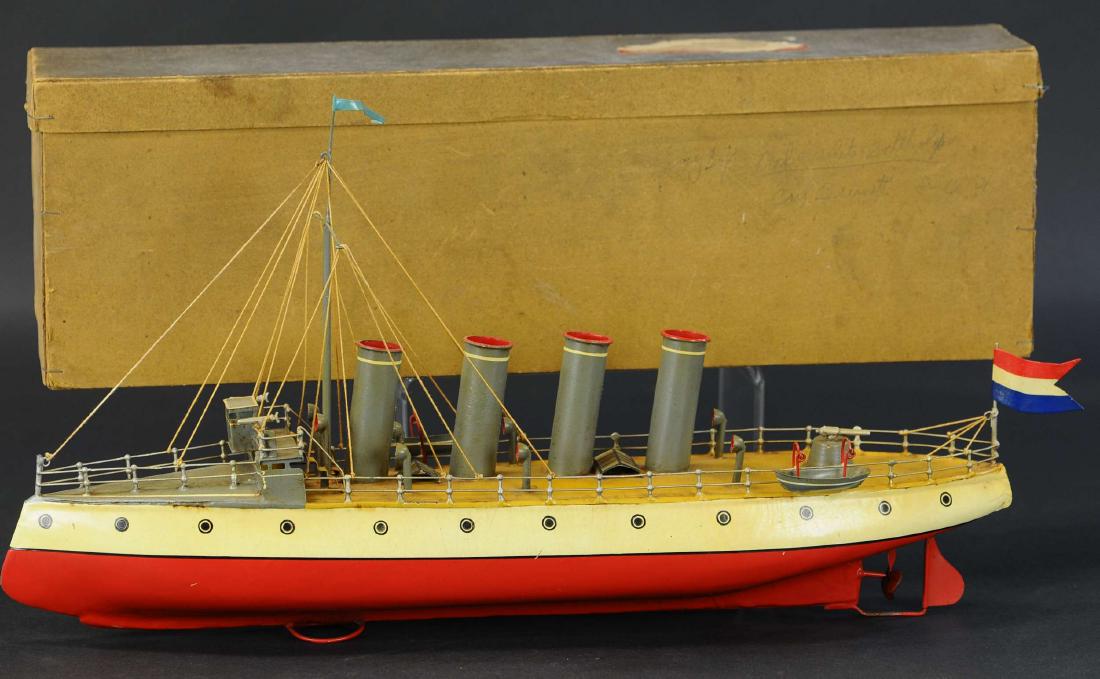 BOXED CLOCKWORK OCEAN LINER: 671. BOXED CLOCKWORK OCEAN LINER | Manufacturer unknown, a unique clockwork ship with four stacks and a tall mast rising from the forward deck, features a gun at its rear and two smaller guns on the s