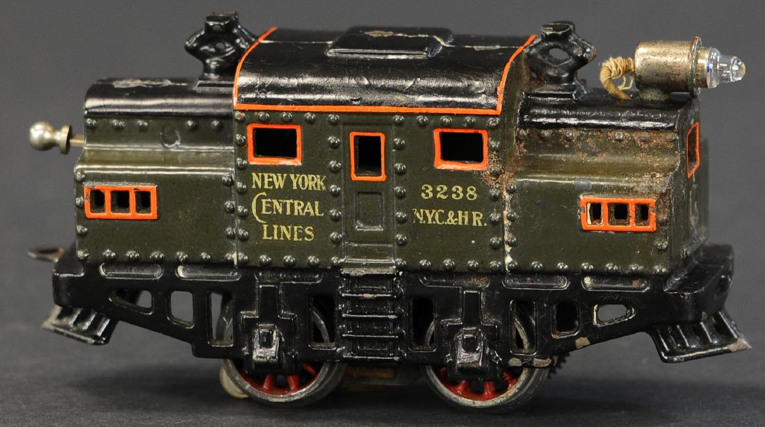 BING ELECTRIC BOX CAB LOCOMOTIVE: 727. BING ELECTRIC BOX CAB LOCOMOTIVE | O gauge, electric, marked "New York Central Lines", electric headlight at one end. | 6.5" l.