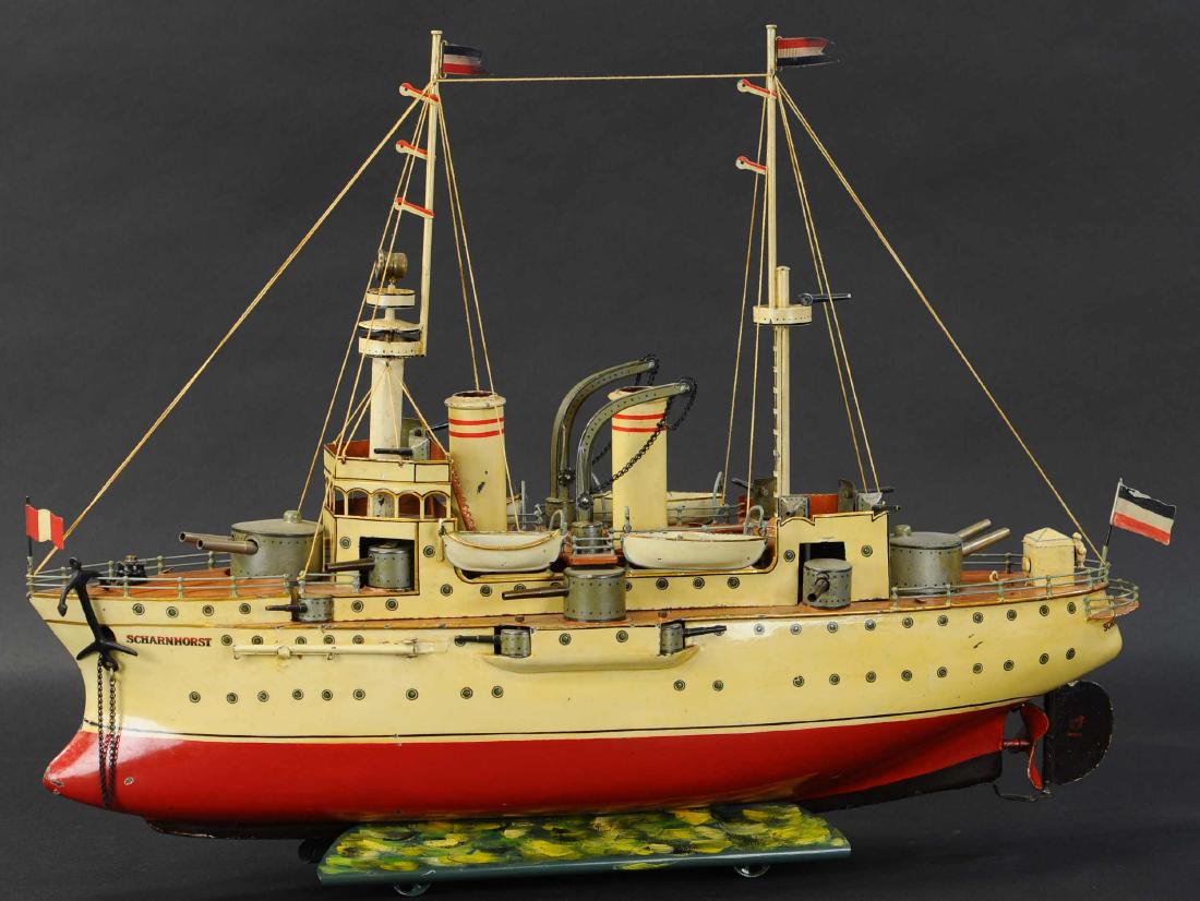 MARKLIN BATTLESHIP SCHARNHORST: 753. MARKLIN BATTLESHIP SCHARNHORST | Very attractive clockwork ship, two stacks, two tall masts, and a unique bridge with large cut-out windows, features two large cannons at each end and multiple ot
