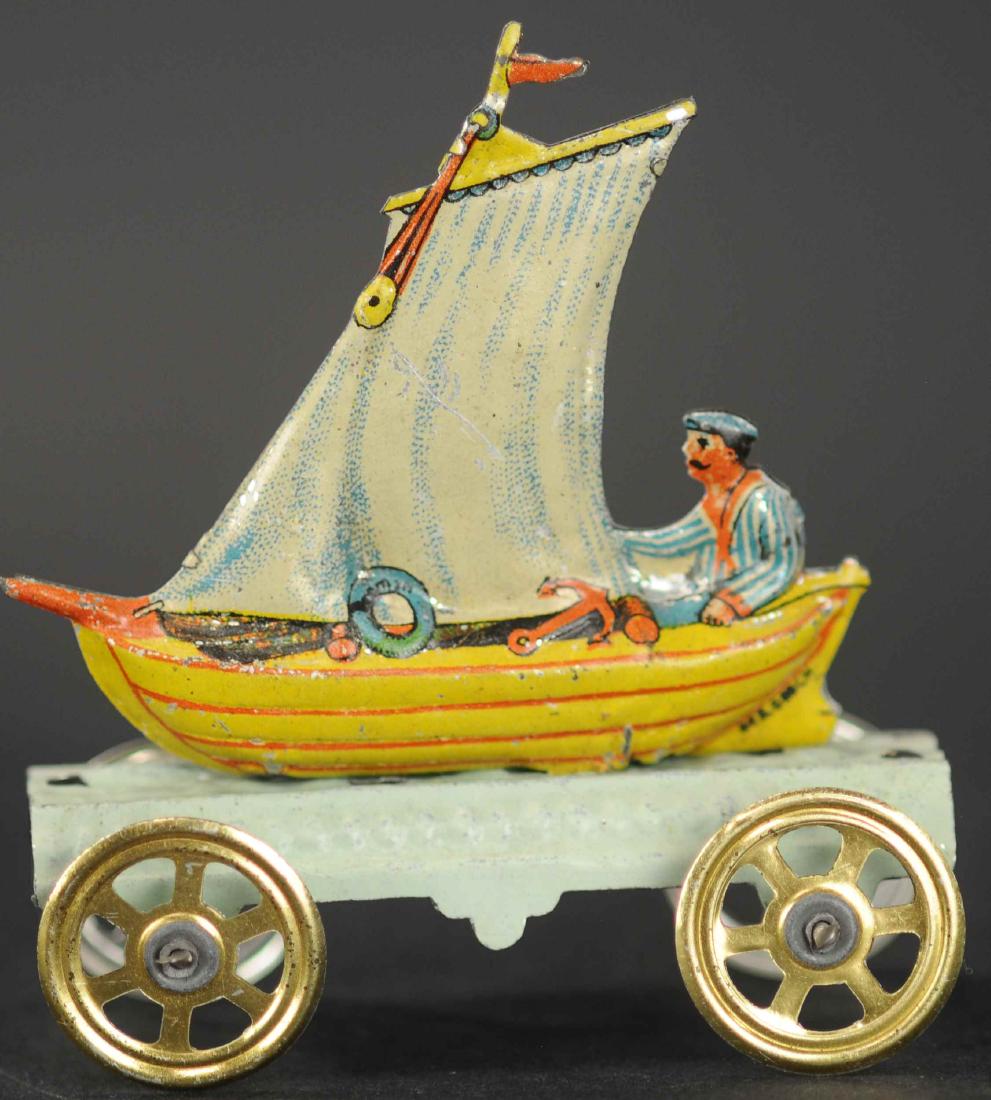MEIER MAN IN SAIL BOAT PENNY TOY: 160. MEIER MAN IN SAIL BOAT PENNY TOY