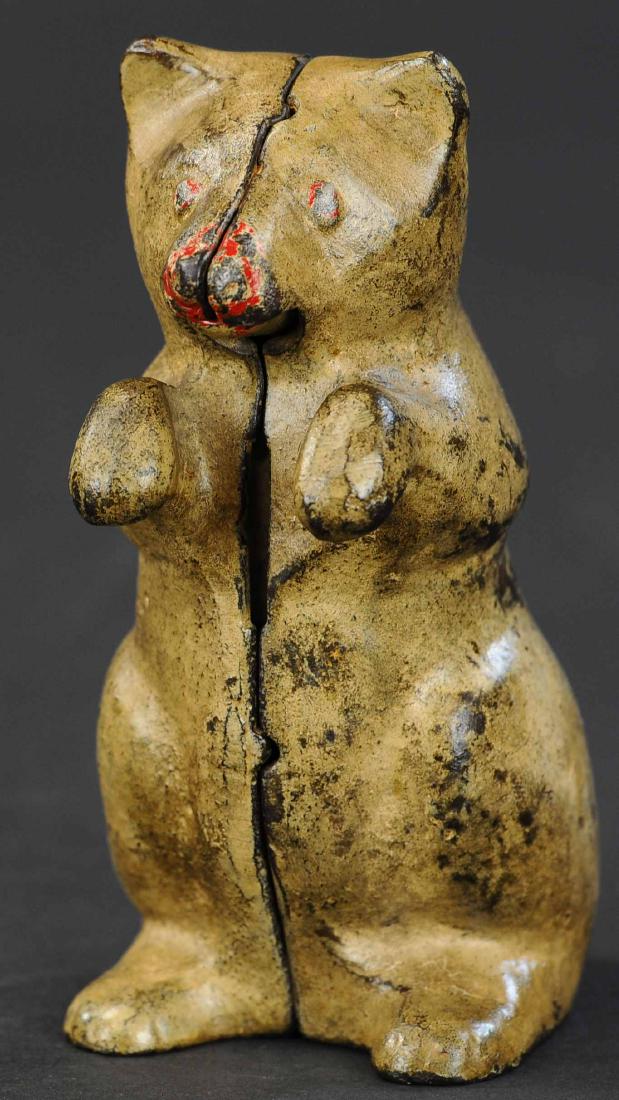 BEGGING BEAR STILL BANK: 315. BEGGING BEAR STILL BANK | Kenton, c. 1910. | 6.5" h.