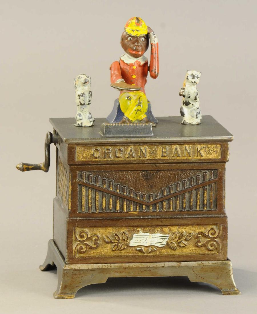 ORGAN BANK MECHANICAL BANK - CAT & DOG: 79. ORGAN BANK MECHANICAL BANK - CAT & DOG | Kyser & Rex Co., Provenance: Max Berry Collection. | (Exc. Cond.) | $600 - $900