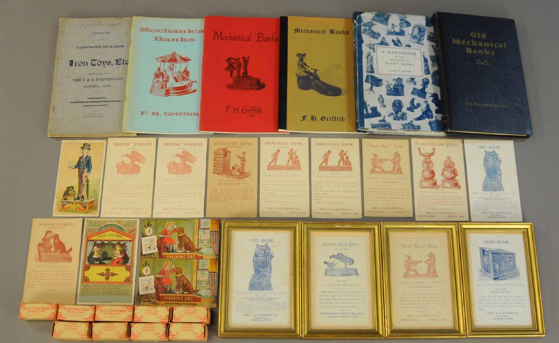 EXTENSIVE MECHANICAL BANK EPHEMERA LOT: 190. EXTENSIVE MECHANICAL BANK EPHEMERA LOT | Large lot includes two original Stevens sales catalogs, Bellows & Griffith books/catalogs, four trade cards, multiple monochrome cards, and several boxes