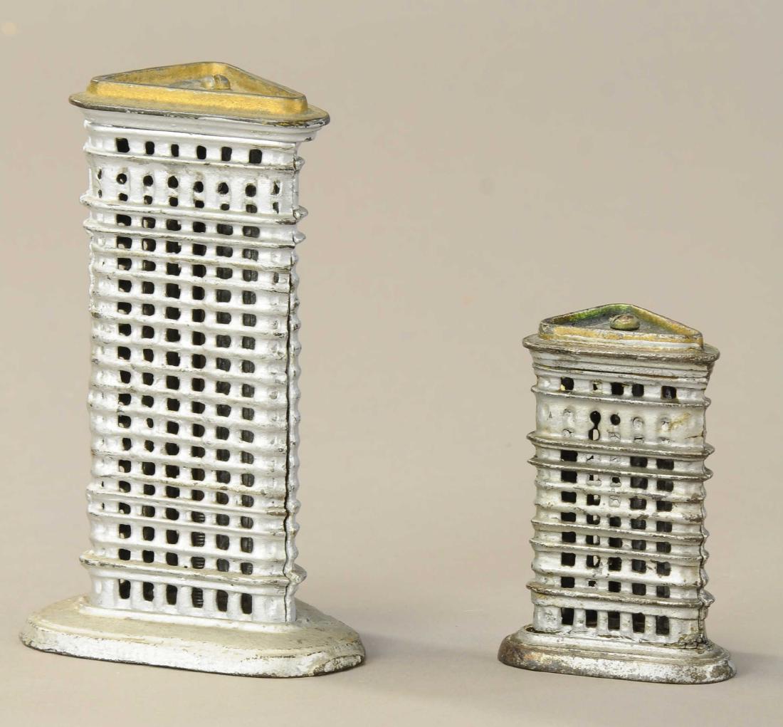 PAIR OF FLAT IRON STILL BANKS: 280. PAIR OF FLAT IRON STILL BANKS | Kenton, small and medium sizes. | 3.5" - 5.5" h. | (Exc. Cond.) | $400 - $600