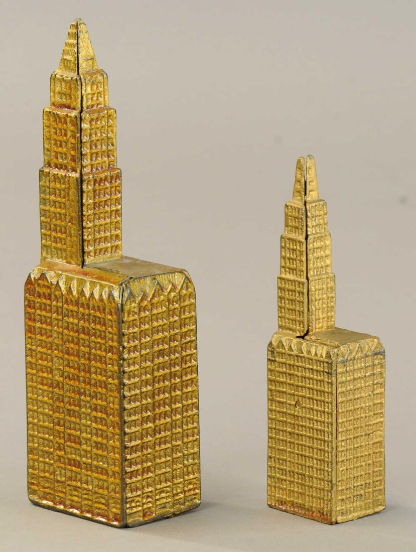 TWO WOOLWORTH BUILDING STILL BANKS: 282. TWO WOOLWORTH BUILDING STILL BANKS | Kenton, c. 1915 | 5.5" - 8" h. | (Exc.-Pristine Cond.) | $200 - $400