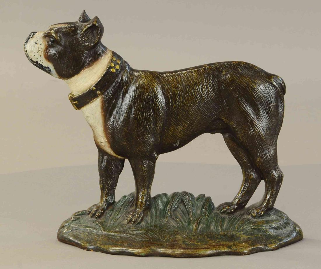 BOSTON TERRIER DOORSTOP: 389. BOSTON TERRIER DOORSTOP | Probably Bradley & Hubbard, great size an beautiful casting of terrier standing in grass, beautiful paint. | 9.75"h. | (Pristine Cond.) | $400 - $600