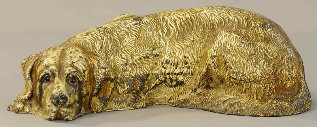ST. BERNARD DOORSTOP: 394. ST. BERNARD DOORSTOP | Hubley, Cat. #388, full figured, depicts St. Bernard laying down with endearing facial expression. | 11"l. | (Exc. Cond.) | $300 - $500