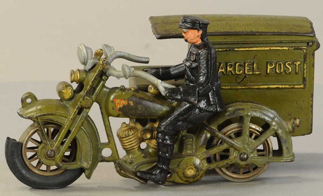 HUBLEY PARCEL POST MOTORCYCLE: 402. HUBLEY PARCEL POST MOTORCYCLE | 10"l. | Crack repairs at two back fenders, original door, tires distressed, overall (VG-Exc. Cond.) | $600 - $900