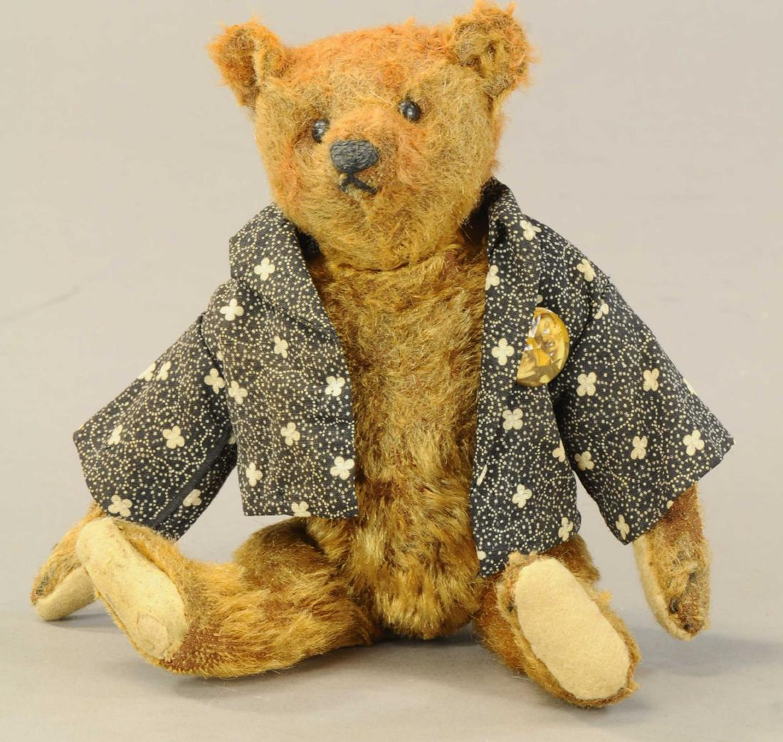10" EARLY STEIFF BEAR: 461. 10" EARLY STEIFF BEAR | c. 1910, color is brown through back of head, seems cinnamon in color, eyes and nose appear original, pads replaced except for one, a nice bear in a rarer color, Teddy Roo