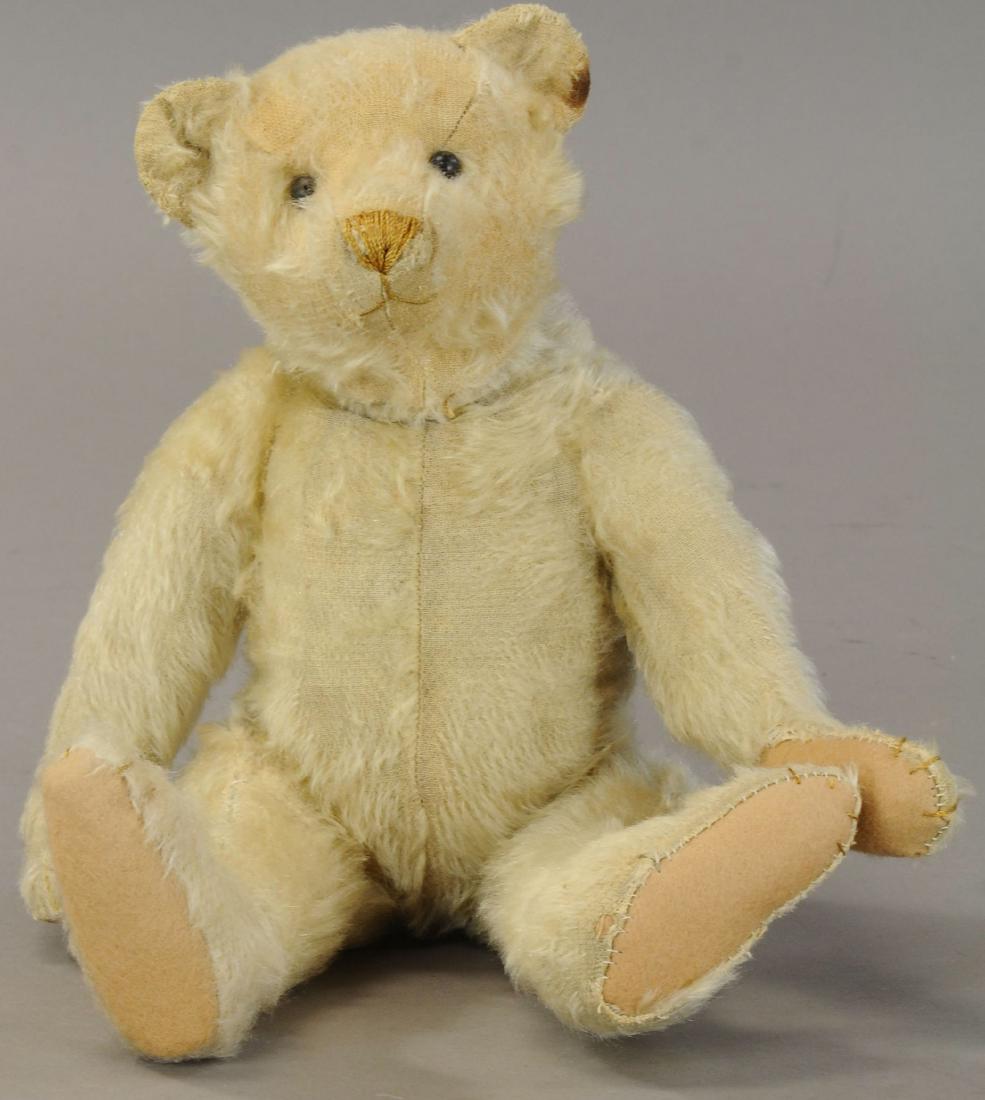 16" STEIFF BEAR: 468. 16" STEIFF BEAR | White, shoe button eyes, cream stitched nose, mohair thinning throughout, pads replaced, nevertheless attractive looking bear looking for a good home. | Missing button in ear. (
