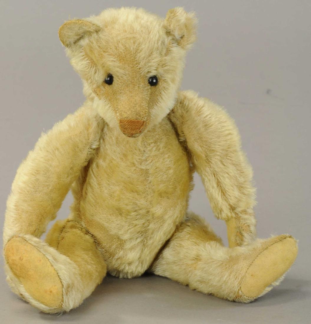13" EARLY GERMAN BEAR: 470. 13" EARLY GERMAN BEAR | Blonde mohair, brown stitched nose, shoe button eyes, Steiff look alike, very attractive for non-Steiff bear. | One thumbprint bare spot by right leg. (Very Good Condition