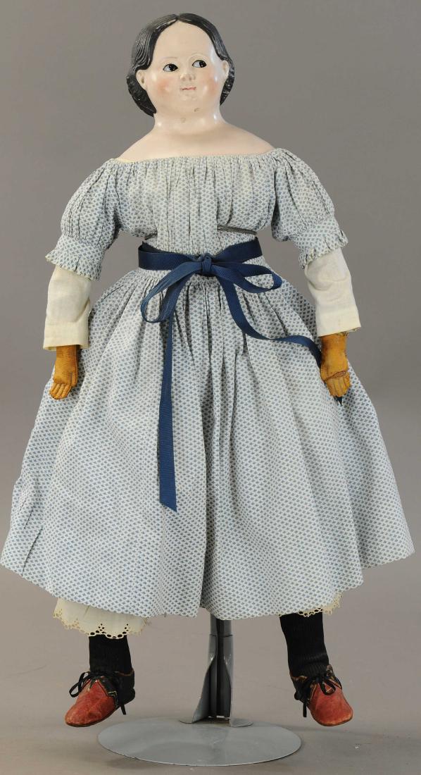 PAPIER MACHE W/RARE GLASS 'FLIRTY' EYES: 483. PAPIER MACHE W/RARE GLASS 'FLIRTY' EYES | Lovely 1850's era 'Pre-Greiner' type doll with so called 'covered wagon' hairstyle with muslin stuffed boy with leather forearms (worn), dressed in perio