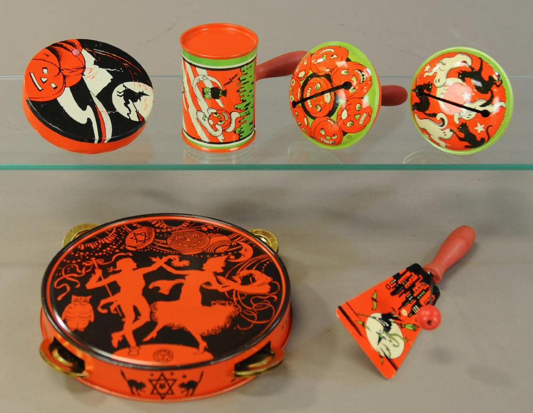 ASSORTMENT OF SIX HALLOWEEN NOISE MAKERS: 521. ASSORTMENT OF SIX HALLOWEEN NOISE MAKERS | Chein and others, includes tambourine, ratchet and clangers. | 4"-7". | (Excellent Condition) | $150 - $200