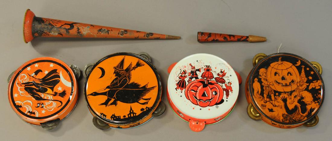 SIX TIN HALLOWEEN NOISE MAKERS: 531. SIX TIN HALLOWEEN NOISE MAKERS | Includes four tambourines and two tin horns. | 6"-14 1/2". | (Good Condition) | $150 - $250