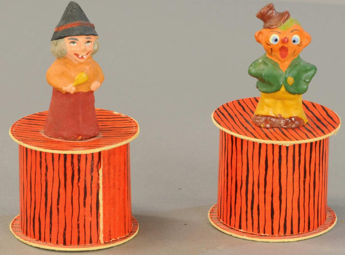 PUMPKIN MAN & WITCH CANDY CONTAINERS: 539. PUMPKIN MAN & WITCH CANDY CONTAINERS | Germany, composition on cardboard tube base. | 5". | (Excellent Condition) | $500 - $700