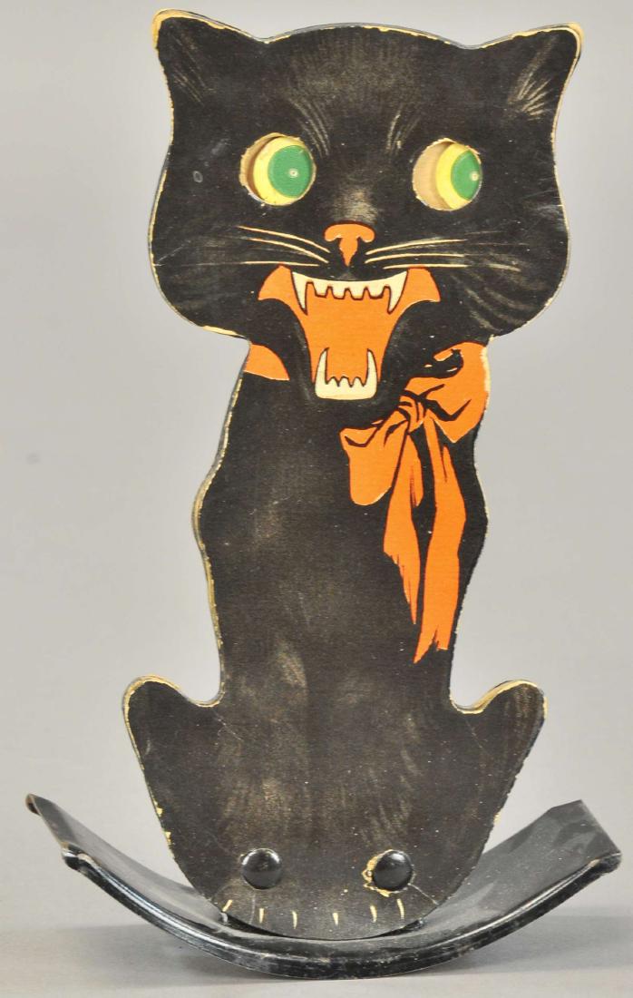 BLACK BOBBLE EYE CAT ON TIN BASE: 579. BLACK BOBBLE EYE CAT ON TIN BASE | 7" h. | (Exc. Cond.) | $100 - $200