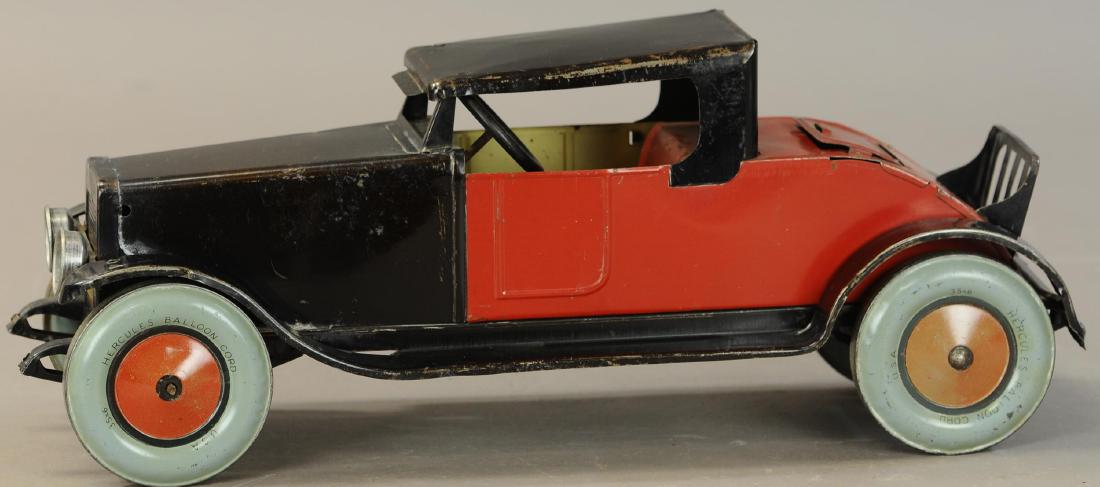 CHEIN HERCULES ROADSTER W/ RUMBLE SEAT: 658. CHEIN HERCULES ROADSTER W/ RUMBLE SEAT | 18" | Headlights are replacements, otherwise (VG Cond.) | $300 - $400