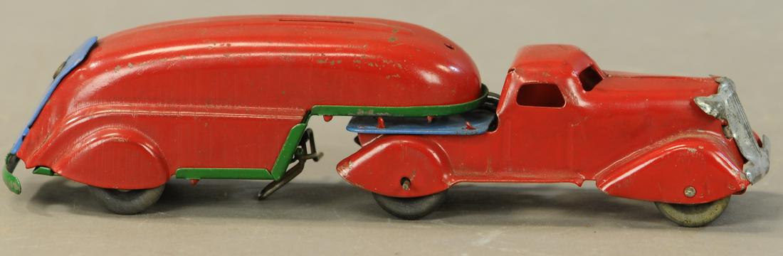 MARX TRACTOR TRAILER STILL BANK: 716. MARX TRACTOR TRAILER STILL BANK | Does not include key for bank trap. | 10" l. | (Exc. Cond.) | $300 - $500