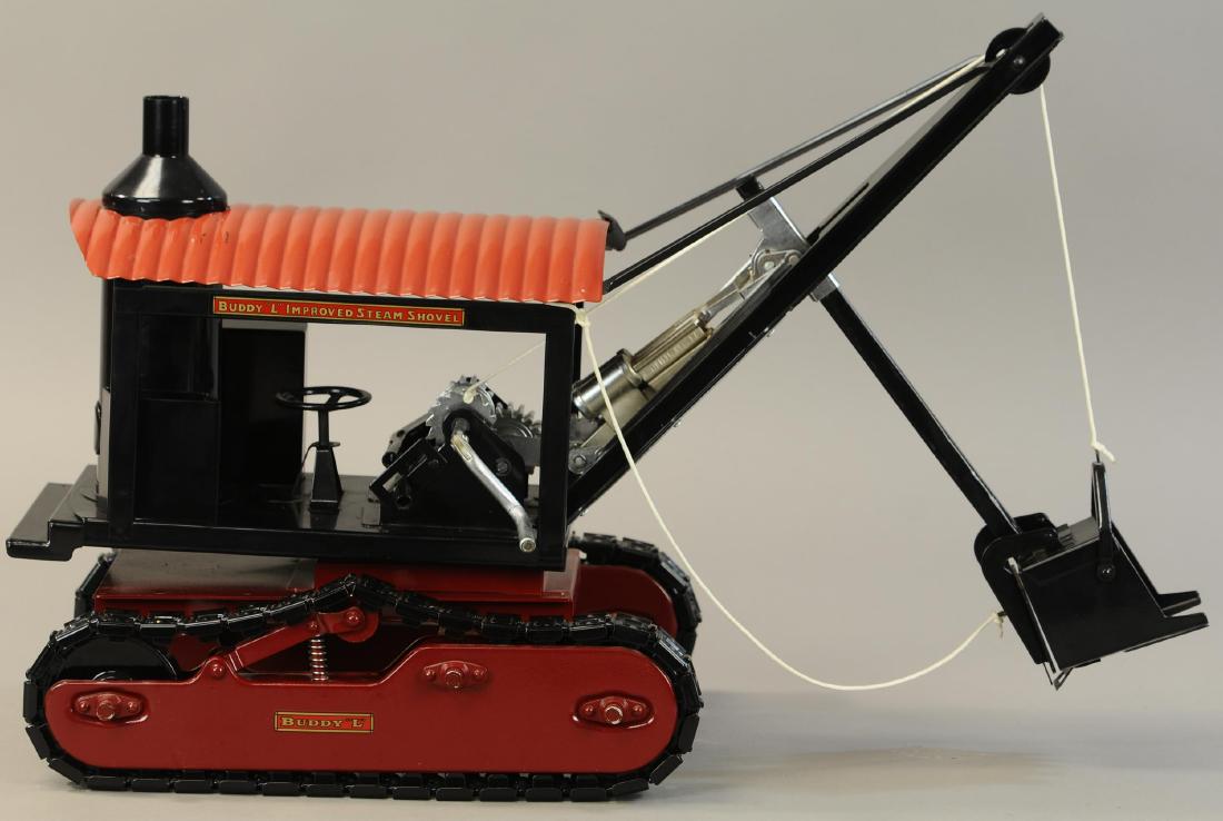 BUDDY L IMPROVED STEAM SHOVEL ON TREADS: 734. BUDDY L IMPROVED STEAM SHOVEL ON TREADS | Manufactured by T Reproductions. | 25" l. | Contemporary, Near Mint. | $600 - $900