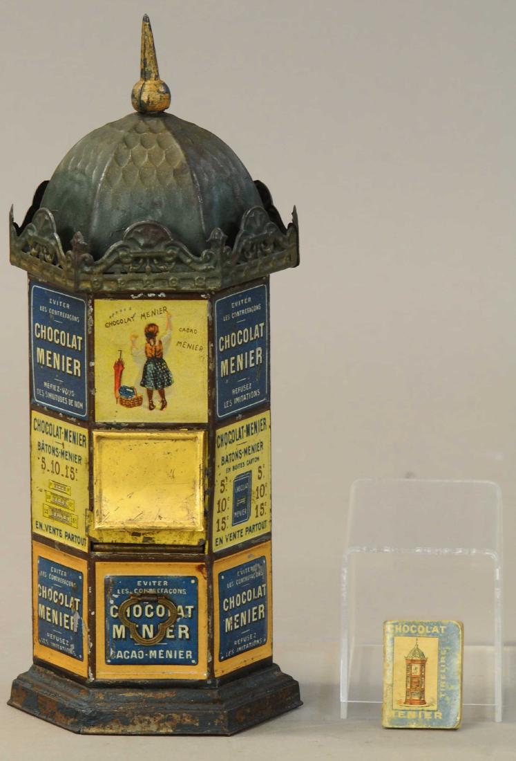 CHOCOLATE MENIER KIOSK W/ ALMANAC: 1021. CHOCOLATE MENIER KIOSK W/ ALMANAC | Familiar French chocolate vending machine comes with a tiny matching Almanac which is extremely charming! | 11" | (Exc. Cond.) | $800 - $1,200
