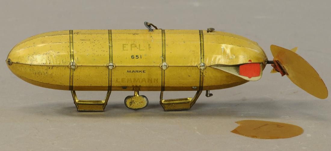 LEHMANN EPL I DIRIGIBLE: 1090. LEHMANN EPL I DIRIGIBLE | 8" | One celluloid tailfin is broken off but present, otherwise in (Exc. Cond.) | $300 - $400