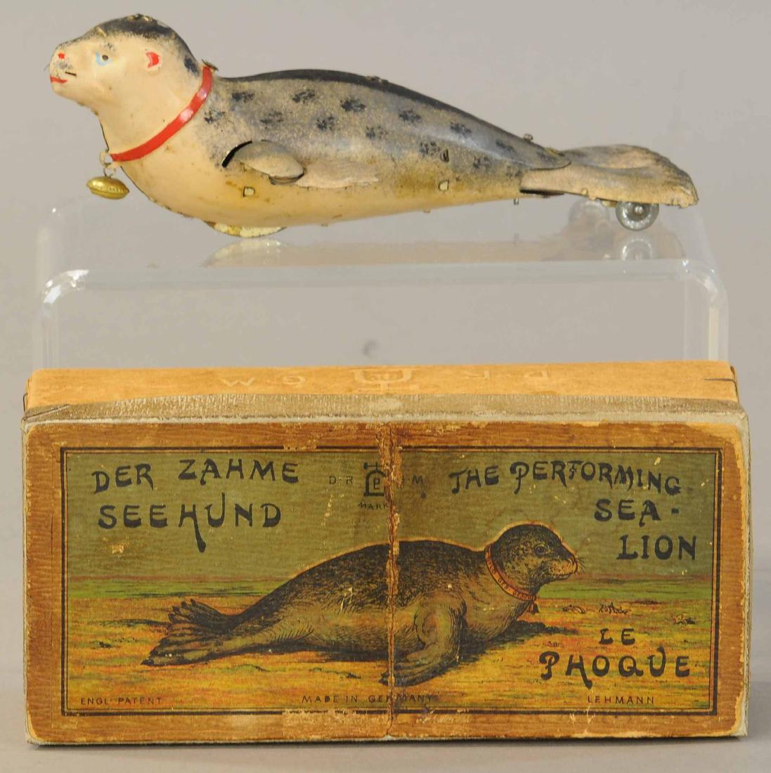LEHMANN SEA LION W/ BOX: 1095. LEHMANN SEA LION W/ BOX | 7.5" l. | Box lid is reinforced with new cardboard, (Pristine Cond.) | $400 - $600