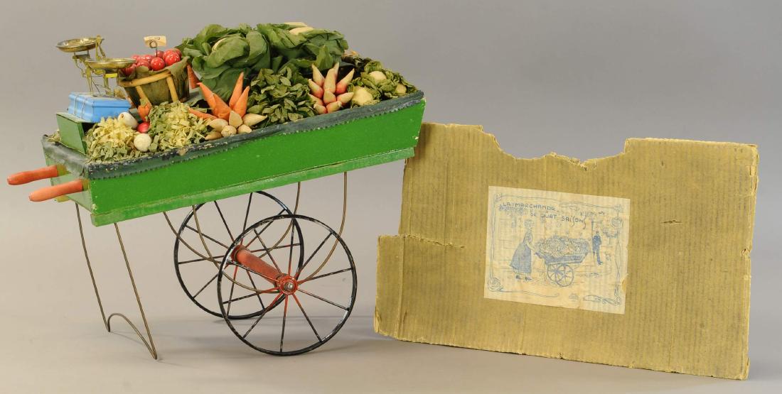 OVERSIZED MARTIN VEGETABLE CART W/BOX LID: 1101. OVERSIZED MARTIN VEGETABLE CART W/BOX LID | Very unusual find, the box lid wears the Fernand Martin logo, though there is not a doll included with this oversized cart as shown on the original bo