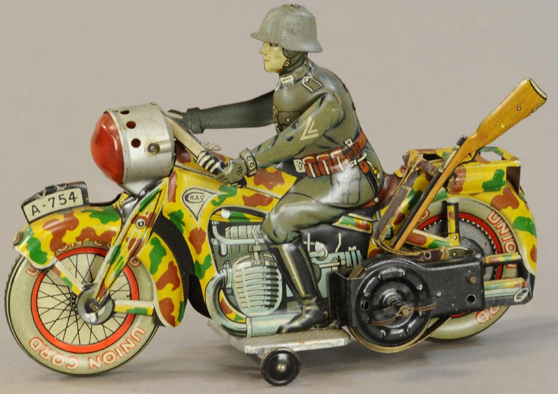 ARNOLD ARMED MILITARY MOTORCYCLE: 1143. ARNOLD ARMED MILITARY MOTORCYCLE | Seldom seen original rifle included. | 7" l. | (Exc. Cond.) | $400 - $600