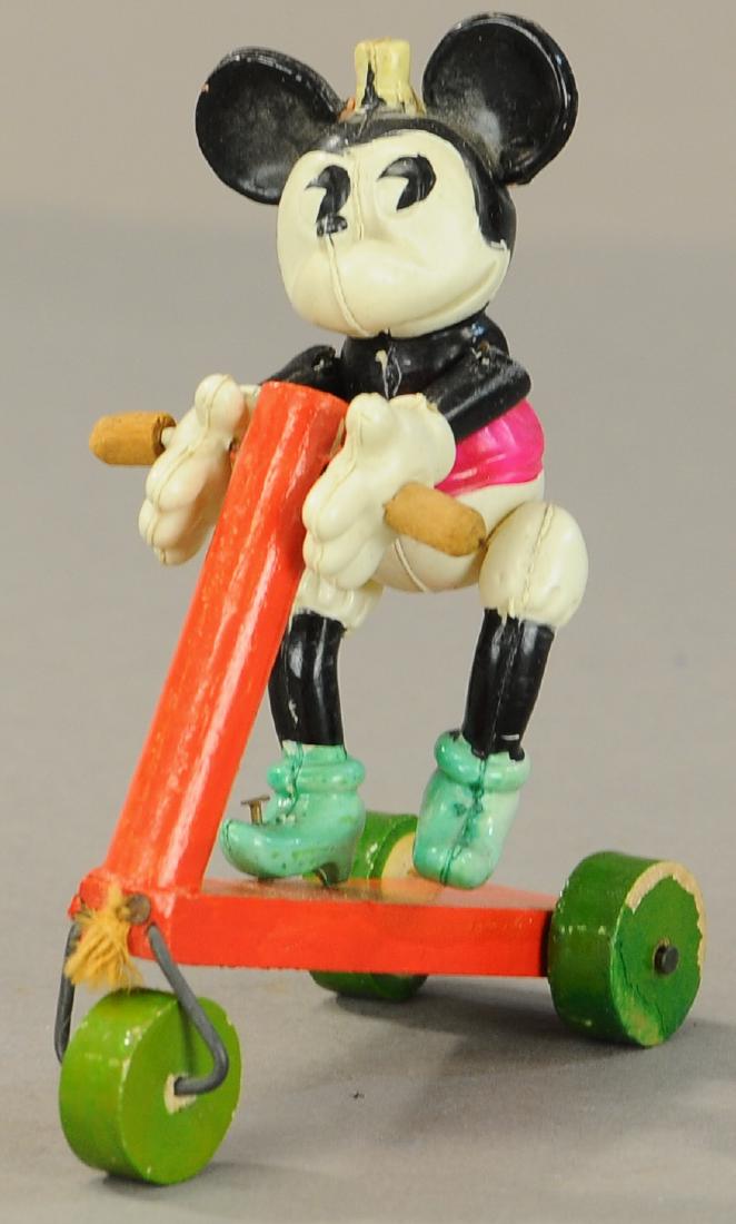 CELLULOID MINNIE MOUSE ON SCOOTER: 1277. CELLULOID MINNIE MOUSE ON SCOOTER | 6.5" h. | (Pristine Condition) | $400 - $700