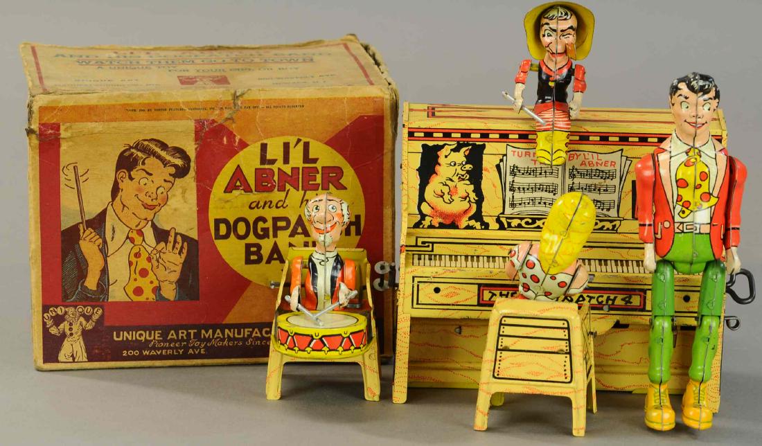 BOXED UNIQUE ART LI'L ABNER BAND: 1283. BOXED UNIQUE ART LI'L ABNER BAND | 9.5" l. | Box lid present though torn, (Exc. - Pristine Cond.) | $300 - $500