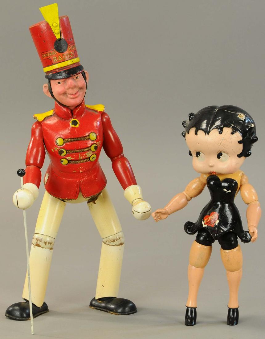 MAXFIELD PARRISH & BETTY BOOP WOOD FIGURES: 1318. MAXFIELD PARRISH & BETTY BOOP WOOD FIGURES | 18" h. | Heads are restored and Betty's forearms repainted, otherwise (Exc. Cond.) | $600 - $900