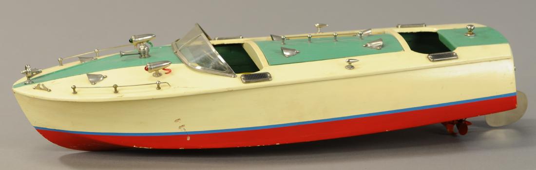 PRE-WAR JAPANESE BATTERY-OP SPEEDBOAT: 1328. PRE-WAR JAPANESE BATTERY-OP SPEEDBOAT | Featured twin electric motors. | 18" l. | Some flaking to original paint, overall in (Exc. Cond.) | $400 - $600