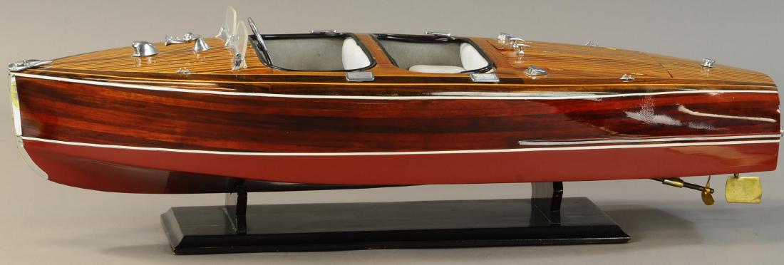 LARGE WOODEN CHRIS CRAFT MODEL SPEEBOAT: 1334. LARGE WOODEN CHRIS CRAFT MODEL SPEEBOAT | 28" l. | Display model, does not have a motor, (Exc. Cond.) | $600 - $800
